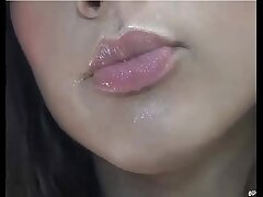 Sucking a dildo