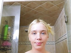 Captivating blonde model took a shower